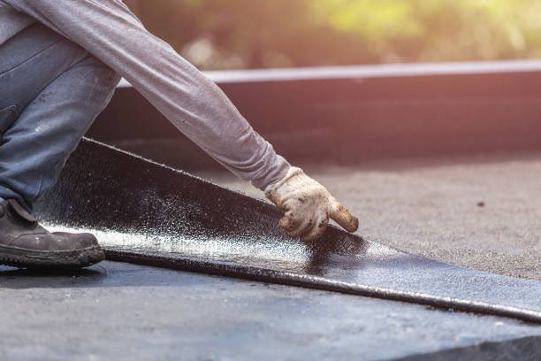 Professional Basement Waterproofing technician working in Fort Madison, IA